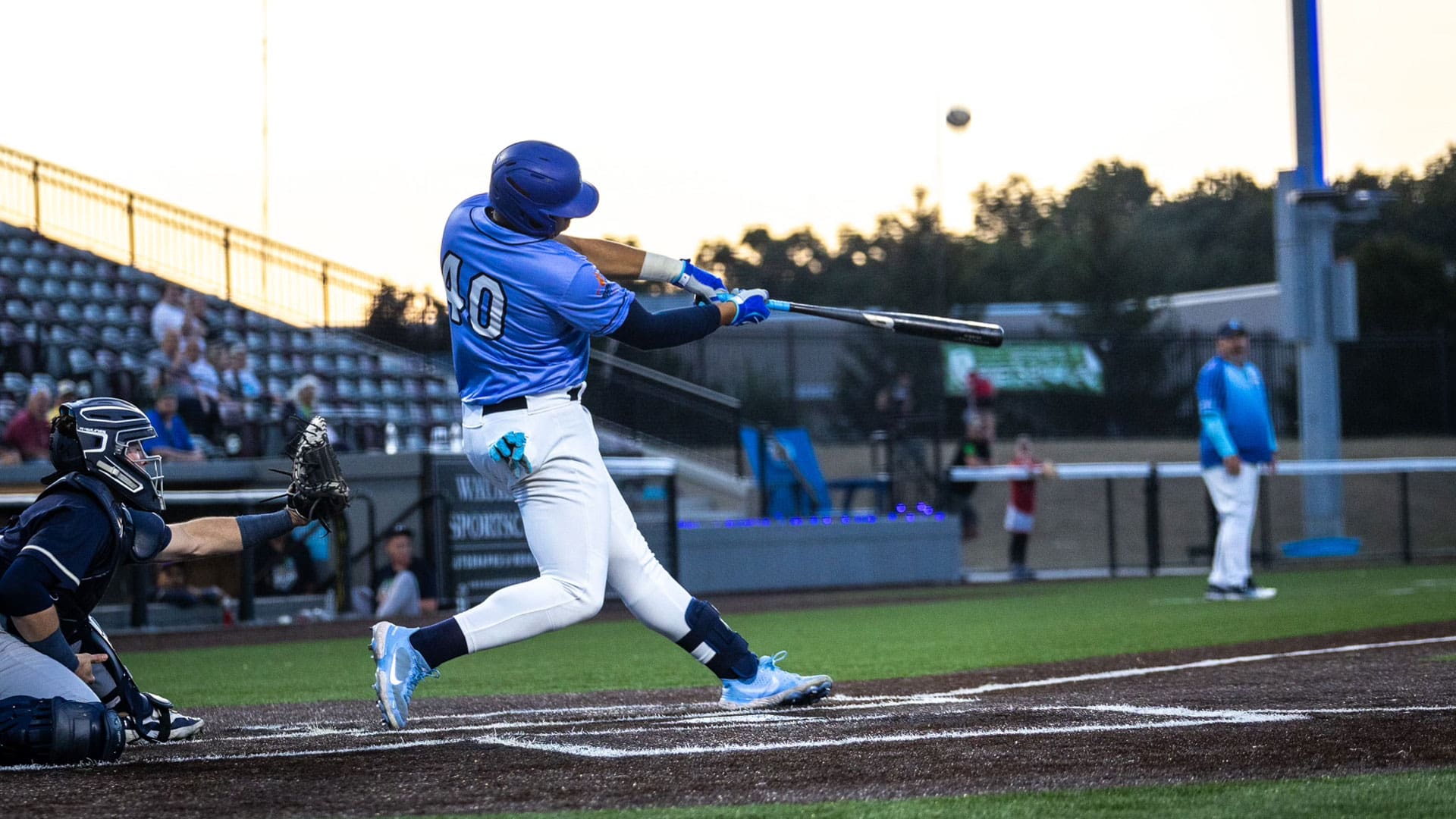 Ryan Hernandez hits a ball during the east division series